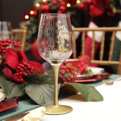 Personalised 'He Sees you When You're Drinking' Christmas Wine Glass - Gold Stem